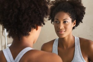 Woman Looking in Mirror
